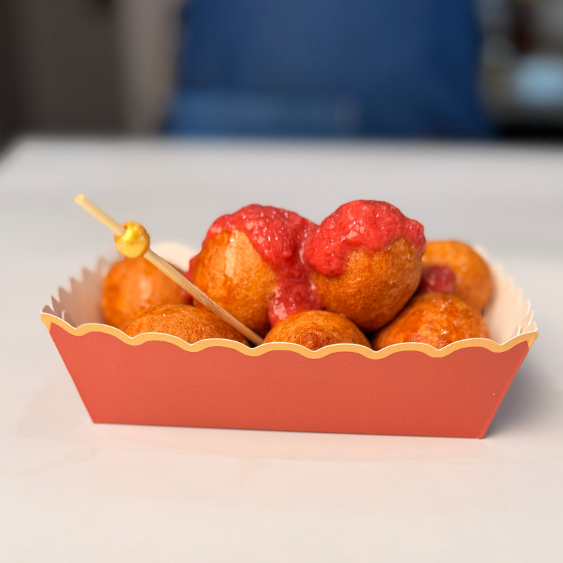 Puff-puff with strawberry topping