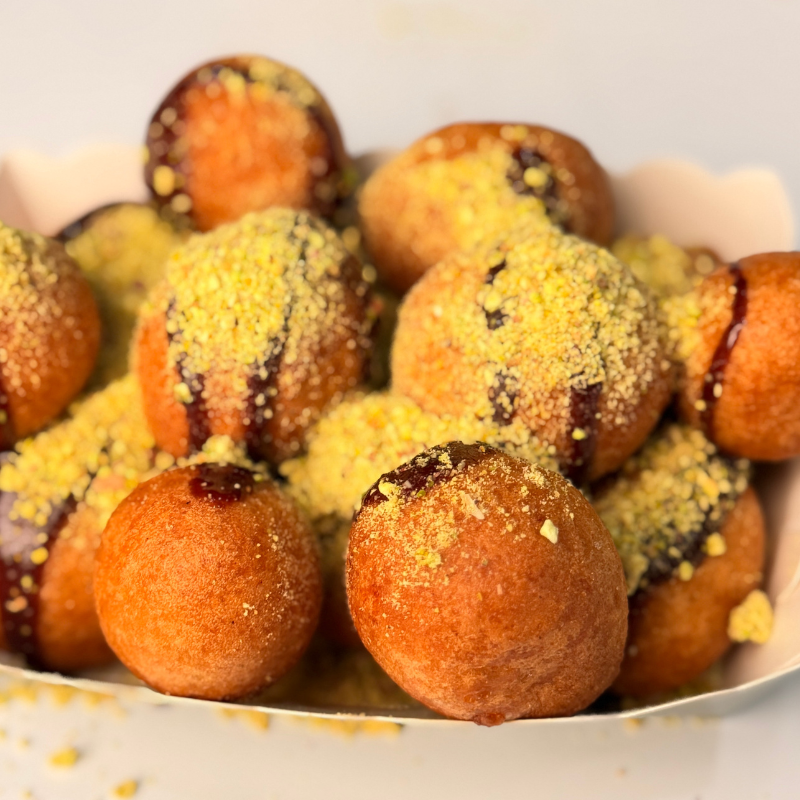 Puff-puff with pistachio topping
